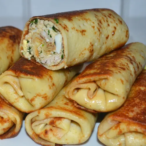 Домашние блинчики с мясом и яйцом